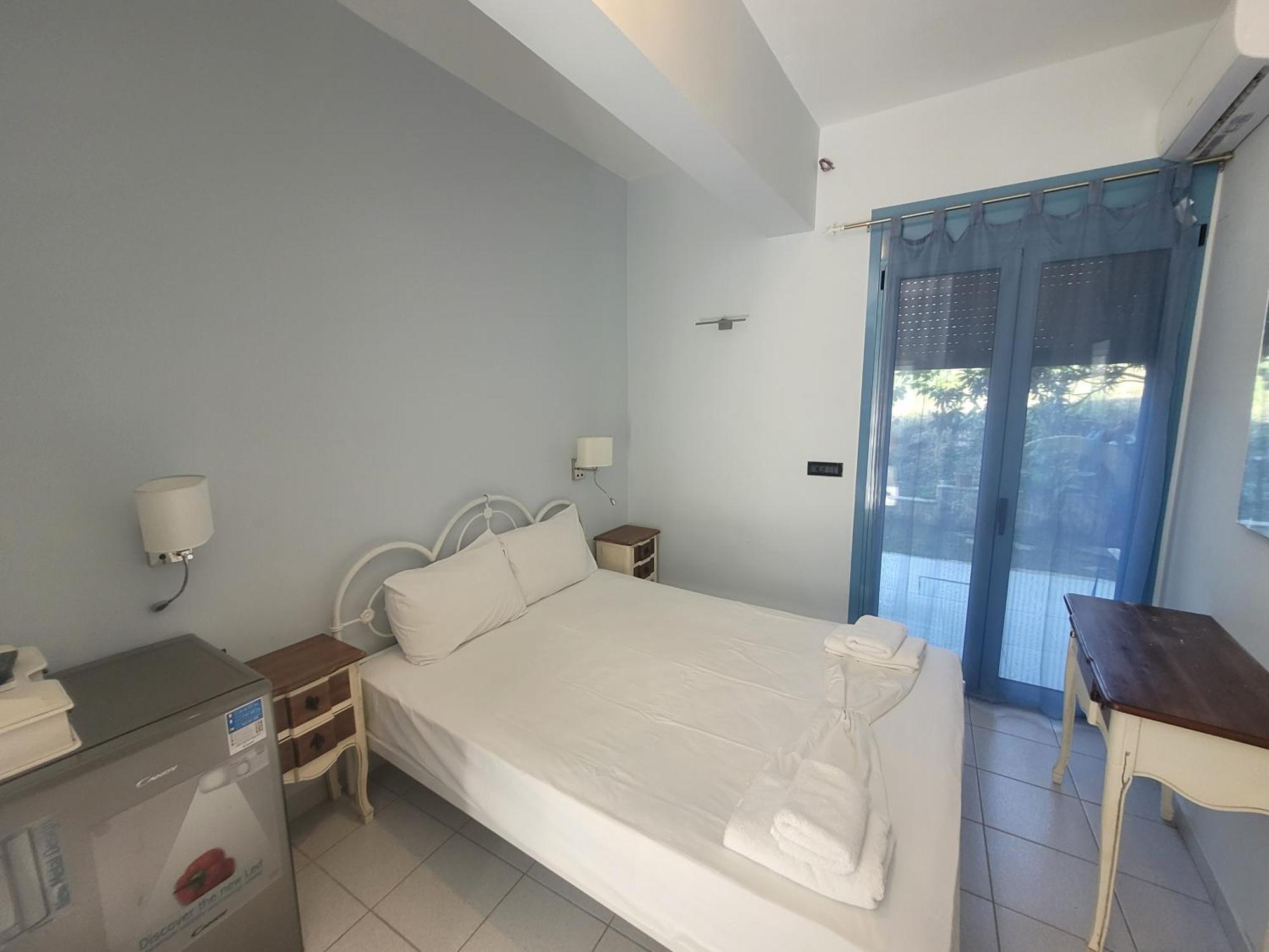 Aκrotiriresort Vasilikí Rom bilde