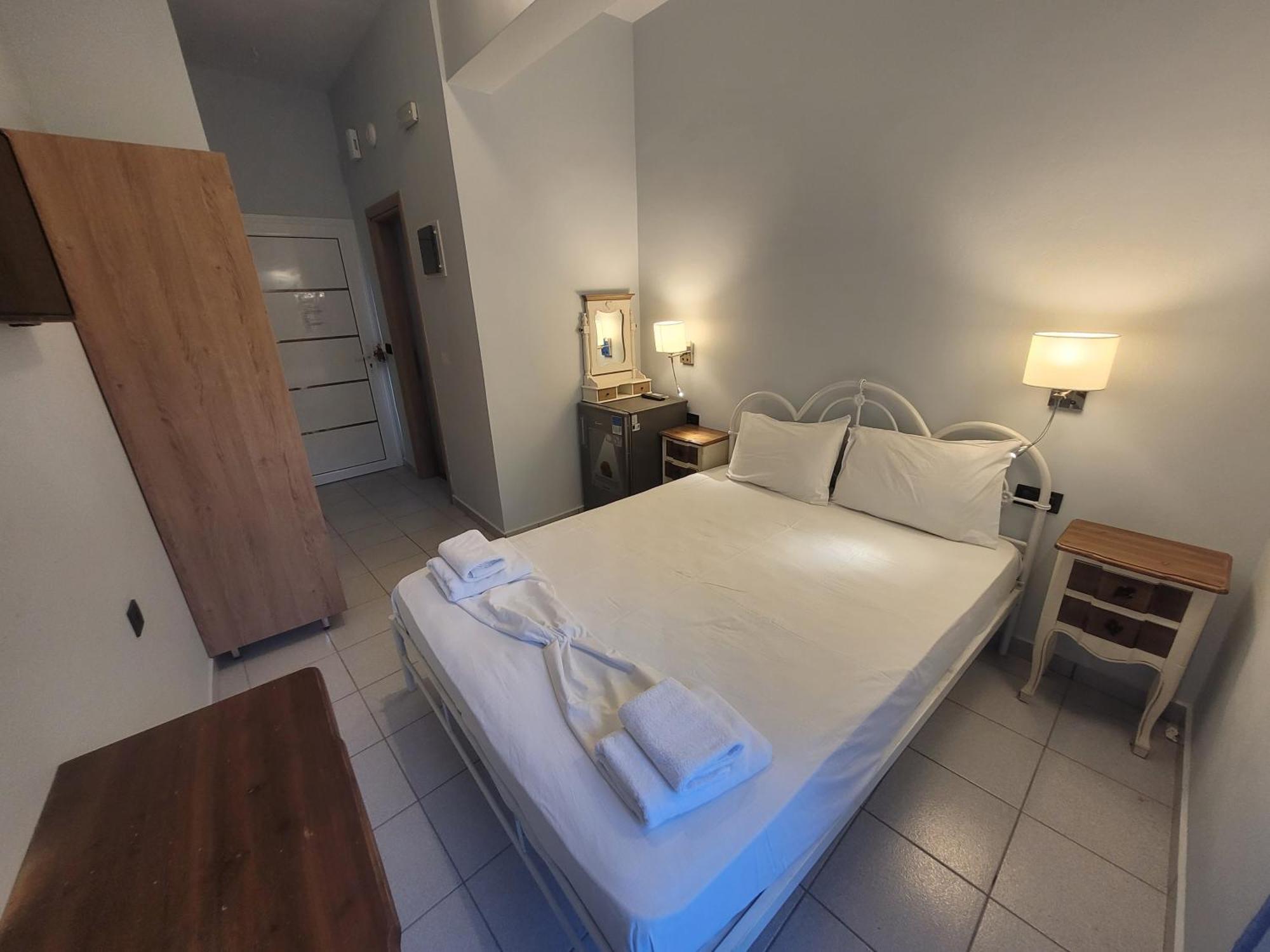 Aκrotiriresort Vasilikí Rom bilde